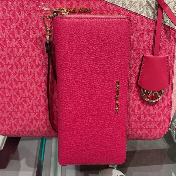 Michael Kors Handbags - MICHAEL KORS
Leather Continental Wristlet Phone Case Wallet 
Electric Pink 
NWT